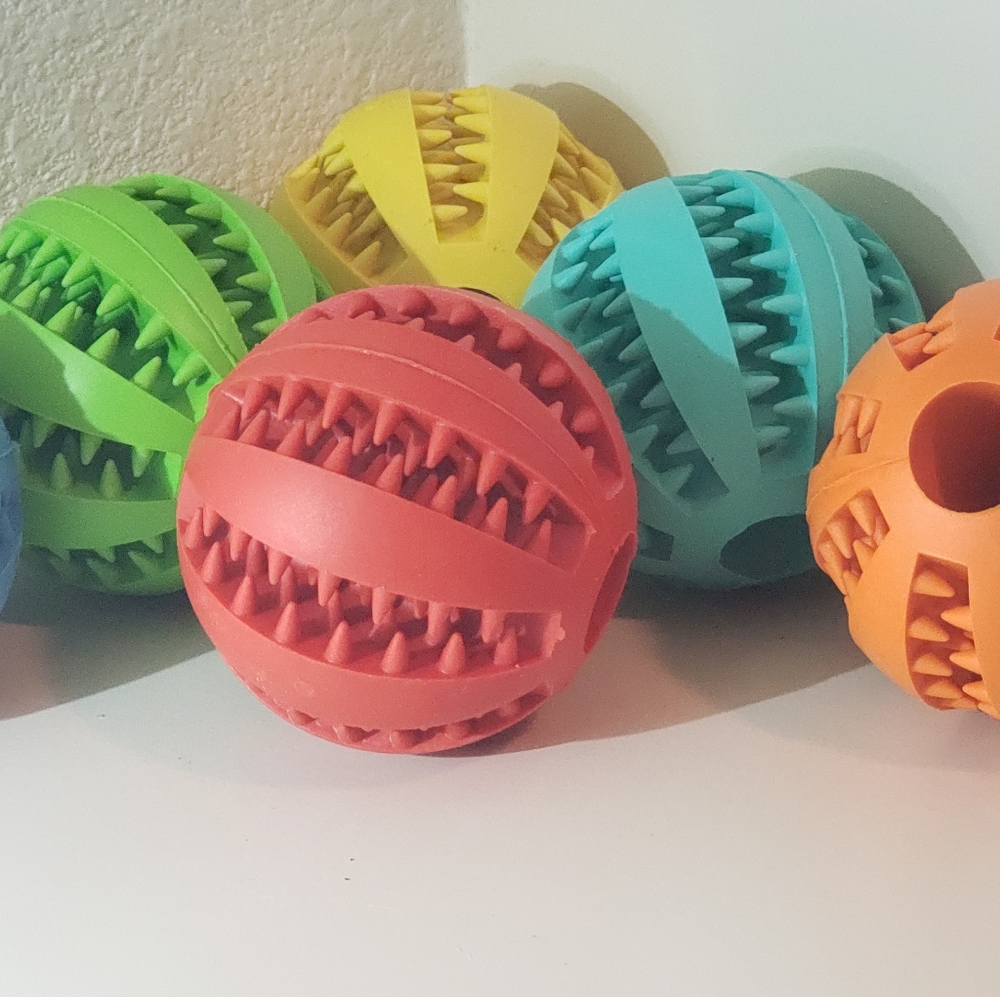 Interactive treat dispensing pet ball